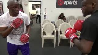 Floyd Mayweather Sr. padwork with unbeaten TMT star Andrew Tabiti