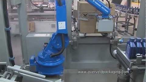 Motoman robot packing bottles with oil
