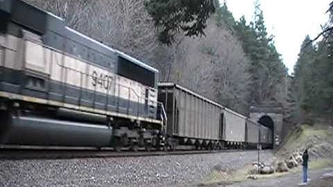 BNSF coal train exits Tunnel 5 along Columbia River Gorge, WA