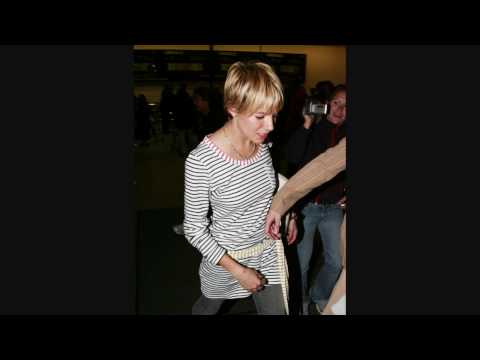 Sienna Rose Miller at LAX - PN8I 0001 - 030606 - PapaBrazzi Report