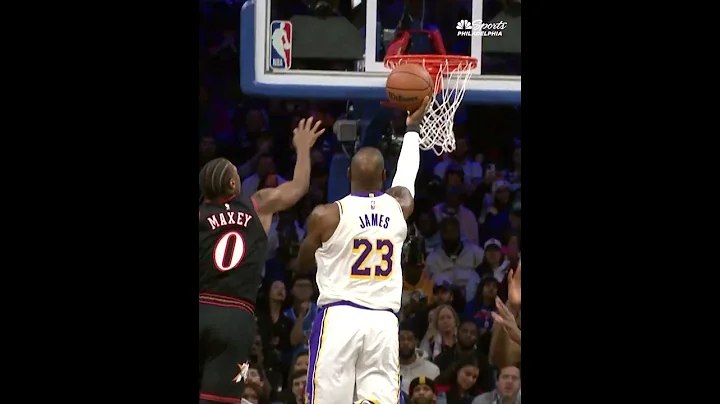 Joel Embiid blocks LeBron James in the first half of the Sixers vs Lakers game on Sunday in Philly