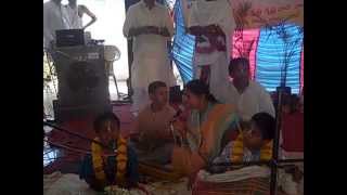 Nimai and Nitai doing kirtan while temple authorities welcome MLA