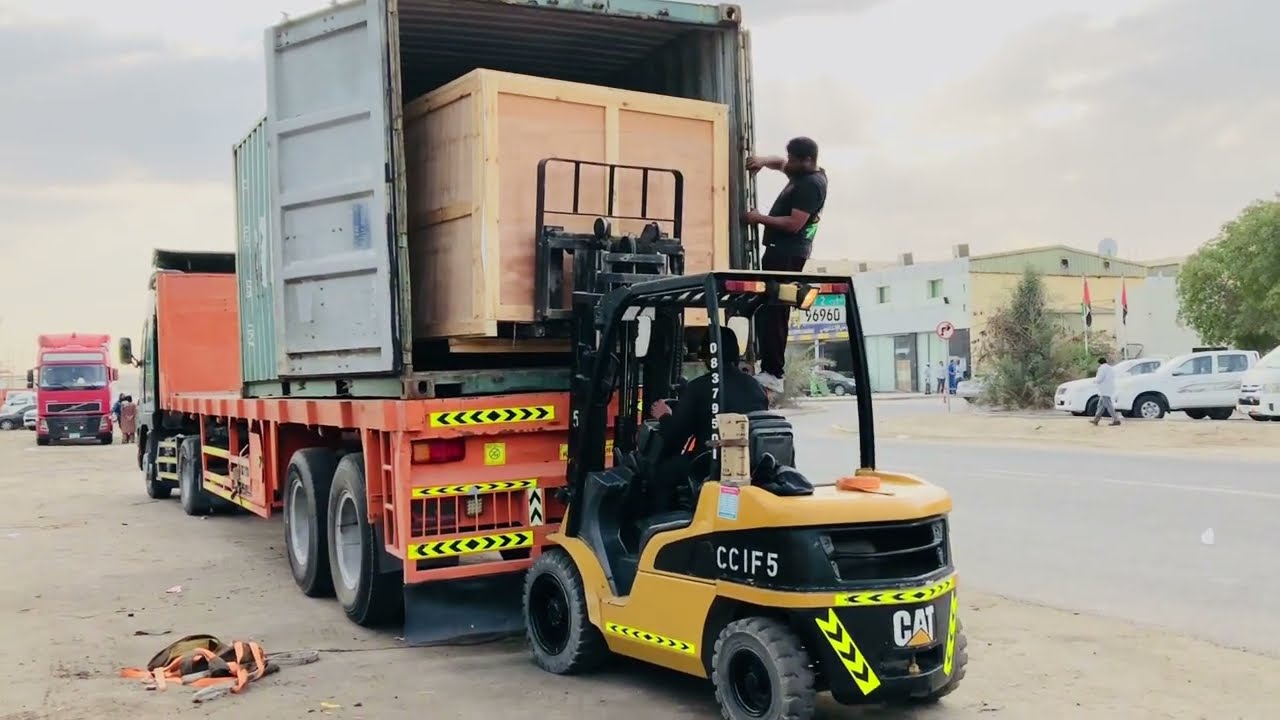 From Container to Flatbed || Masterful Offloading in Action! - YouTube