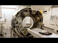 Radiographer films inside of a ct scanner spinning at full speed