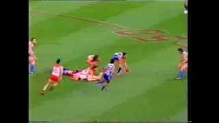 Highlights of the North Melbourne v Sydney MCG shoot out from round 6 - 1991. Freak match.