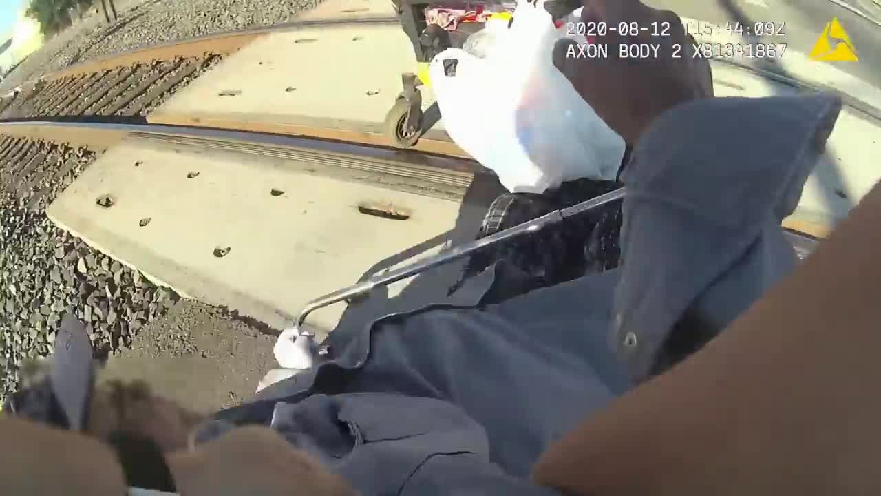 VIDEO: Lodi officer narrowly saves man in wheelchair stuck on train tracks
