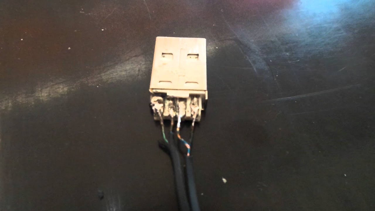 reparación de la conexión del cable del mouse "Genius" al puerto USB