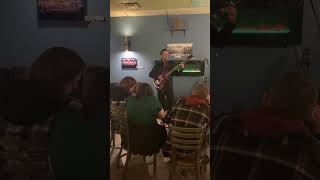 Performing Midgets on Stilts at Stellar Coffee Shop.