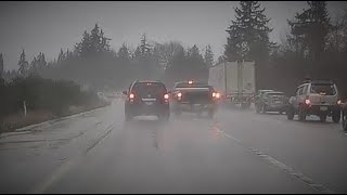Impatient Pickup nearly sideswipes SUV in the rain