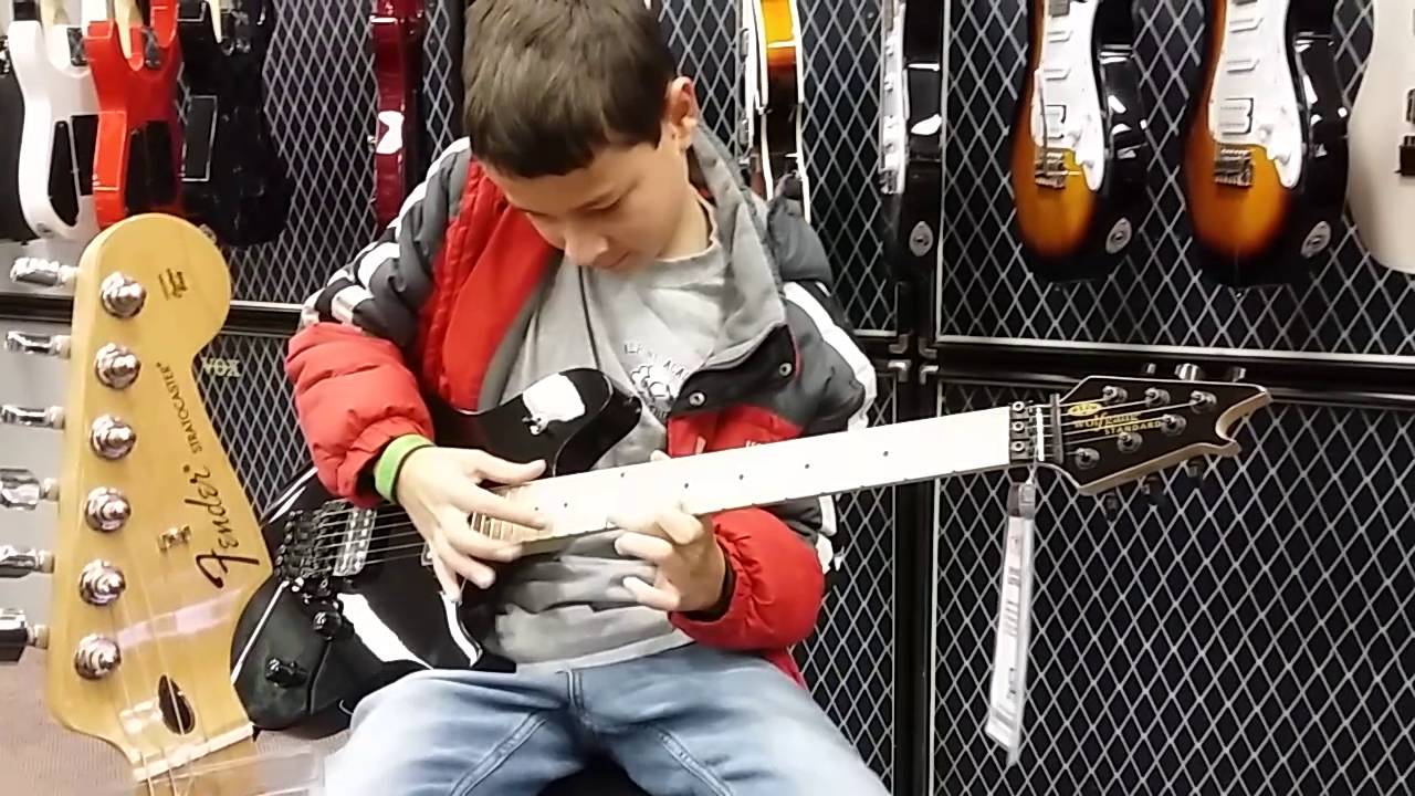 12 Year Old Christopher Ruckman tries out an EVH 5150 at Guitar Center