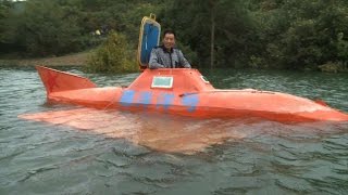 Chinese farmer finds new life in an orange submarine