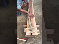this indonesian carpenter create a tool to help in clamping split wooden board with just scrap