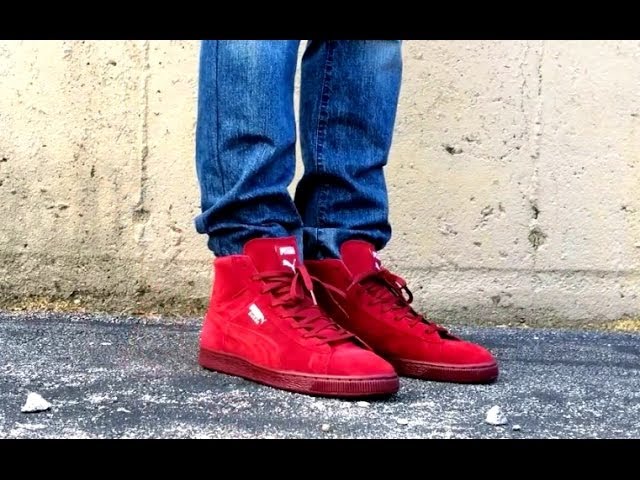 red pumas suede on feet