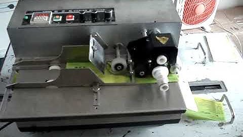 Electric solid ink roll date coding machine for plastic bag/paper box