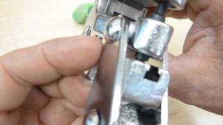 Using a hand punch for sheet metal ("Whitney" type punch)