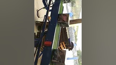 dockless truck loader with flexible roller conveyor