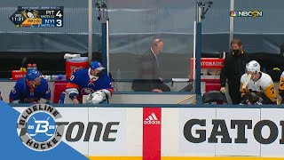: Leo Komarov and Evgeni Malkin chirping in Russian across the bench.