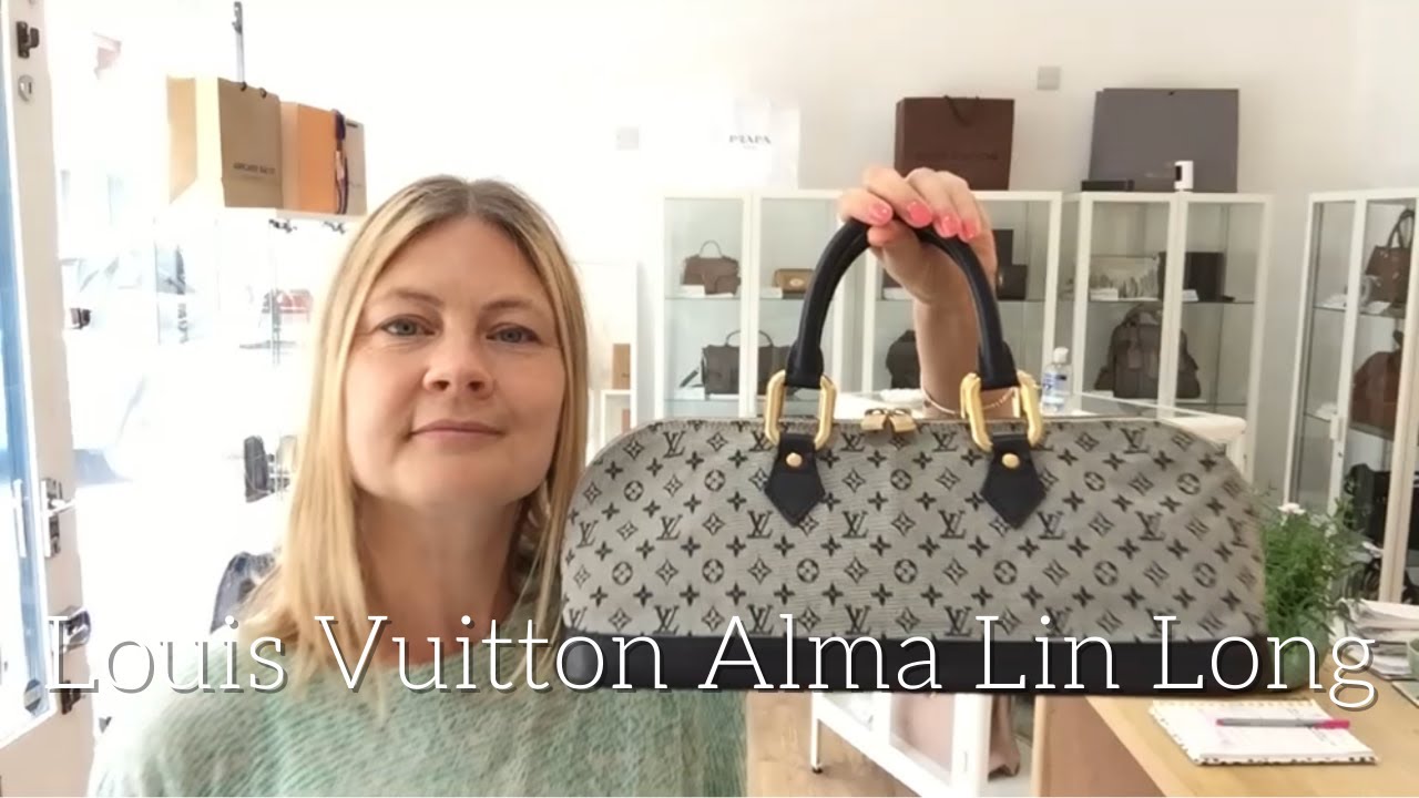 LOUIS VUITTON Mini Lin Alma Haut Tall Bag in Navy - More Than You Can  Imagine