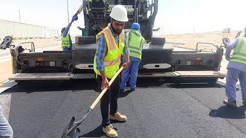 Sampling of Hot Mix Asphalt behind the paver
