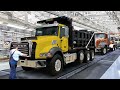 Inside us factory producing giant trucks  mack production line