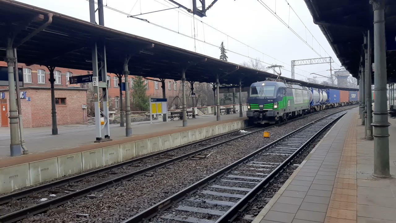 ELL Vectron with freighttrain passing through Opole Central Station.