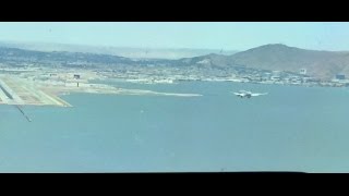 B747 Cockpit view landing in San Francisco with nearby traffic