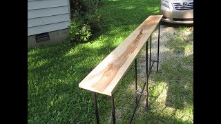 A long and tall sofa table made from ash and iron pipe. I had to join boards end-to-end for the top.