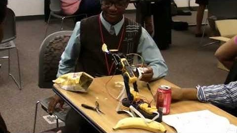 High school students build a robotic arm - NSBE