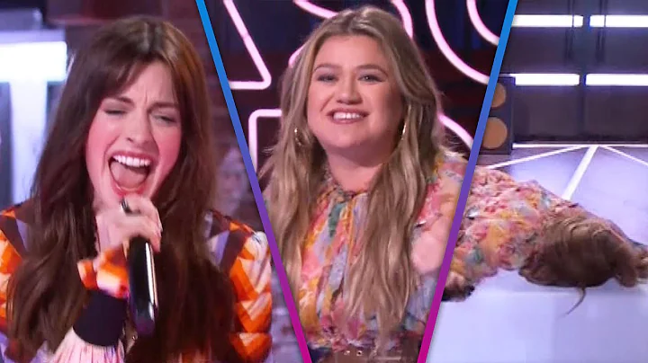 Kelly Clarkson FACEPLANTS as Anne Hathaway Sings '...