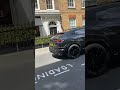 a Lamborghini urus cruising threw London august 2025