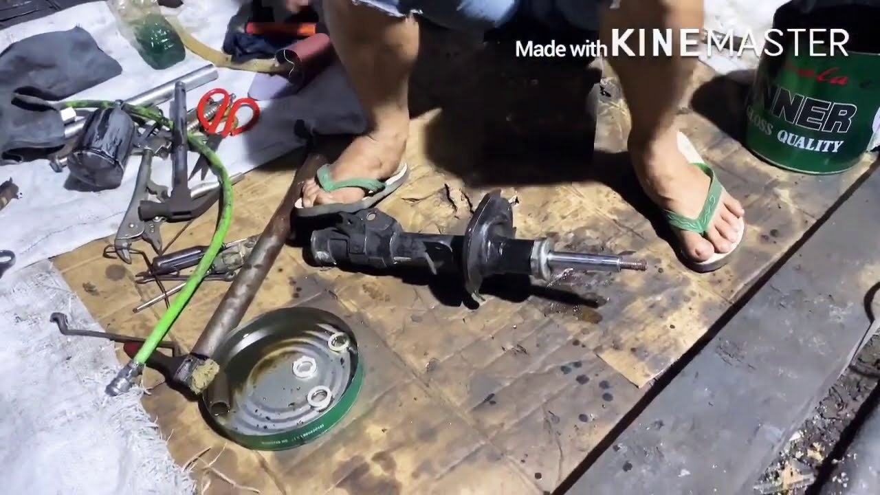 Cara perbaiki/servis Shockbreaker mobil Mazda 2 