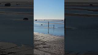 Wildwood NJ flooding up to the boardwalk the morning after Hurricane Erin