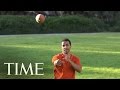 The Science Behind The Football Spiral | TIME image