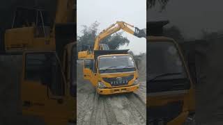 beku gari 250 excavator loaded drum truck