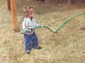 Parker trying to drink from a hose