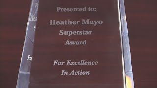 'Superstar' dispatcher awarded for dramatic water rescue of husband and wife