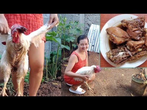 Beautiful woman  slaughter Big Rooster cooked and Eat.