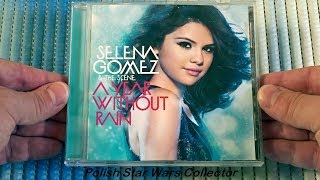 Selena gomez & the scene a year without rain cd album opening reviews
" round , naturally and more hits (p)+(c) 2010 hollywood records /
univer...