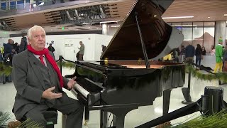 'A nice little surprise': Pianists greet travelers coming home for the holidays at DIA