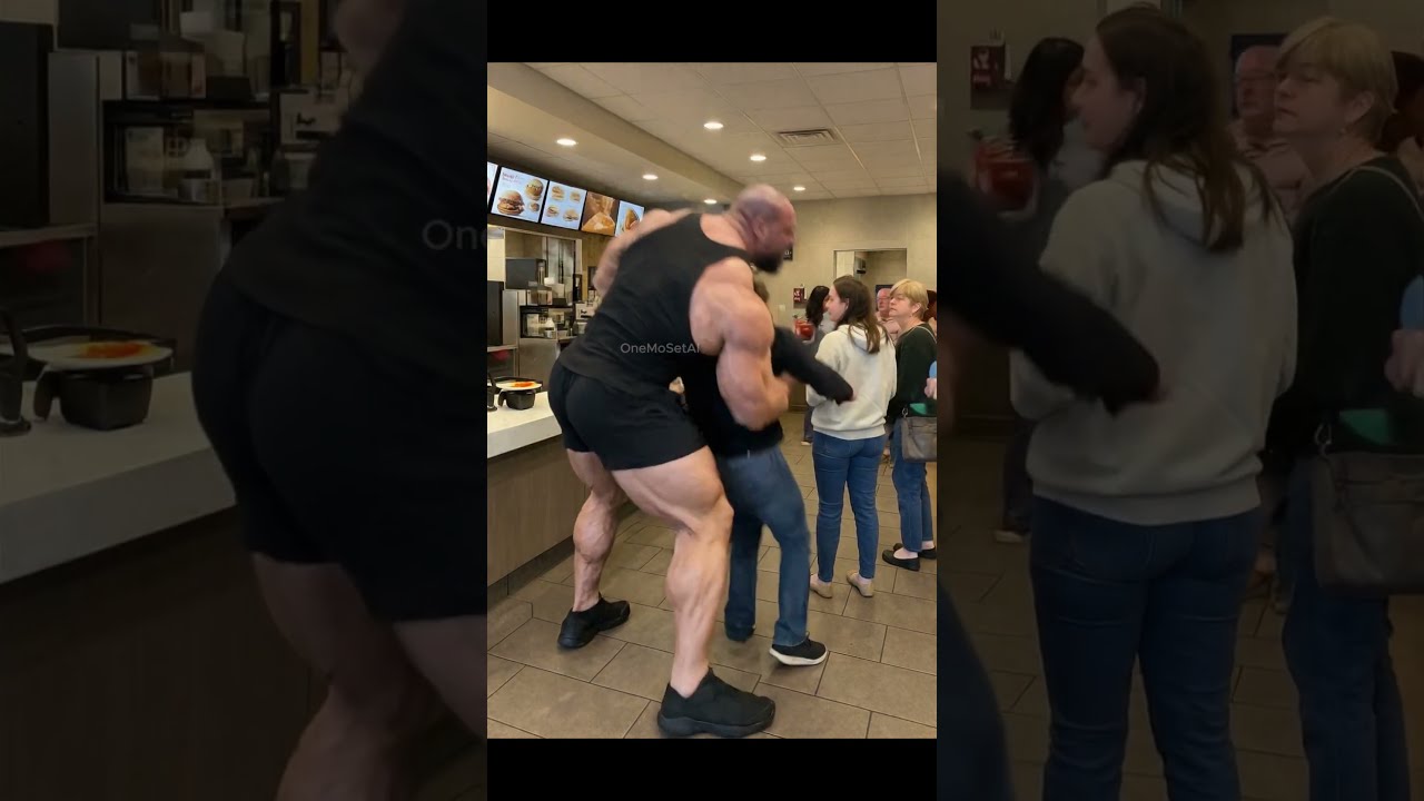 Giant Body Builder Tired Of Waiting In Line 