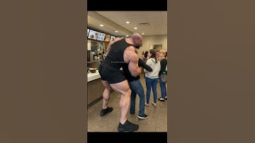 Giant body builder tired of waiting in line!