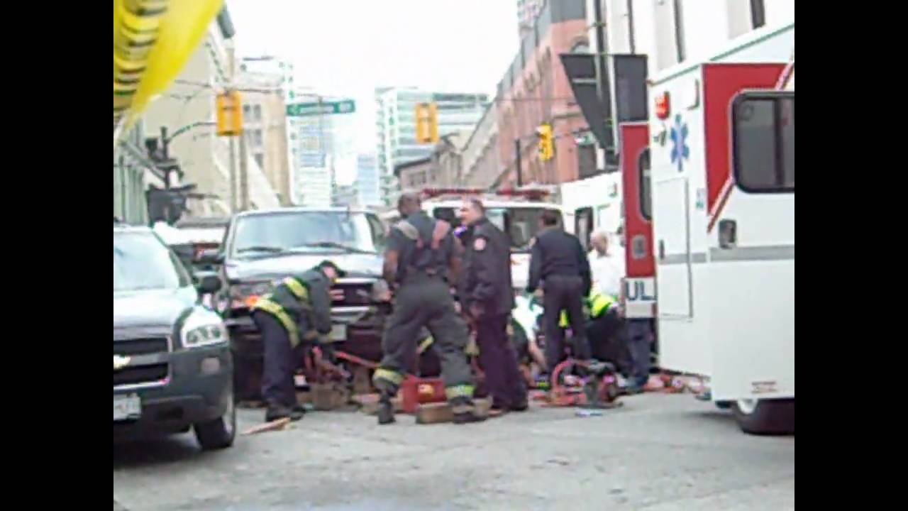 Pedestrian Struck and Pinned under Vehicle - YouTube