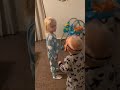 Kid scares his sister with a mask