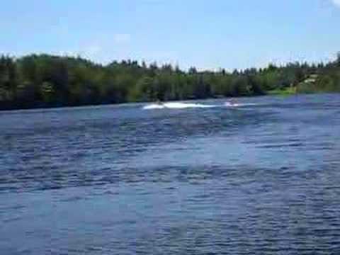 Ron pulling Jill on a tube on our lake. Saint John...