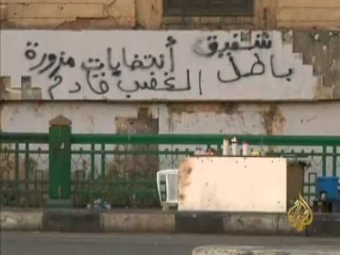الرسوم والكتابات منافسة على جدران القاهرة