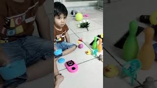 Aarya playing with kichan set