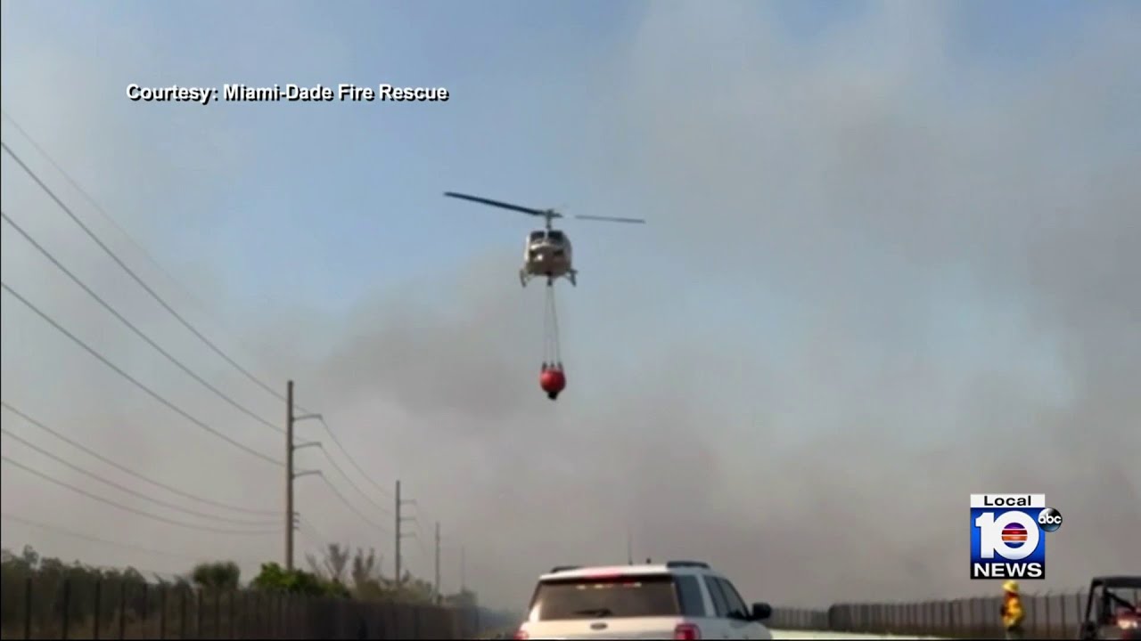 Crews make progress in brush fire battle - YouTube
