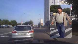 Автохам на Ford Focus в Киеве. Подрезал по-царски и припарковался на дороге. АА6202МВ