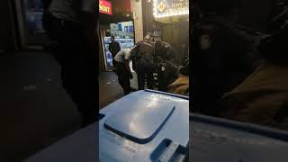 Aboriginal Muslim Aussie man taken in to paddy wagon by coppers