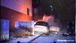 US police rescue teenager from burning car